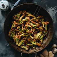 Chinese Cauliflower Stir Fry (干锅菜花) - These crunchy cauliflower bites are cooked in a numbing spicy sauce that is so rich. Even though this recipe is vegan, I’ve included notes on how to add different types of protein, to make a more substantial dish for your dinner. {Vegan, Gluten-Free Adaptable}