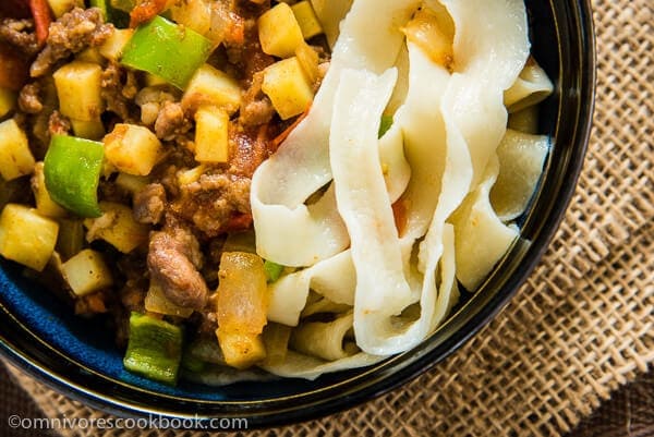 The tender ground lamb meat is cooked with potato, tomato, onion, and pepper to create a simple, colorful, and delectable noodle sauce - Uyghur-Style Noodles with Lamb Sauce (Laghman, 新疆拌面) | omnivorescookbook.com