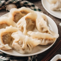 Homemade lamb dumplings with dipping sauce