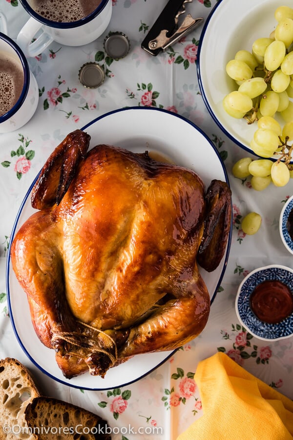 This Cantonese roast chicken tastes even better than one at a good restaurant. The skin is truly crispy and the meat so moist and tender. Want to to cook a perfect Asian style chicken in the oven? Look no further!| omnivorescookbook.com