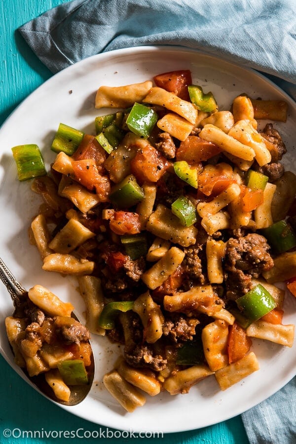 Ding Ding Chao Mian (丁丁炒面) - A hearty fried noodle dish that is cooked with a scrumptious tomato sauce with lamb and peppers. Fast to cook and bold in flavor. A must-have for Xinjiang food lovers. 