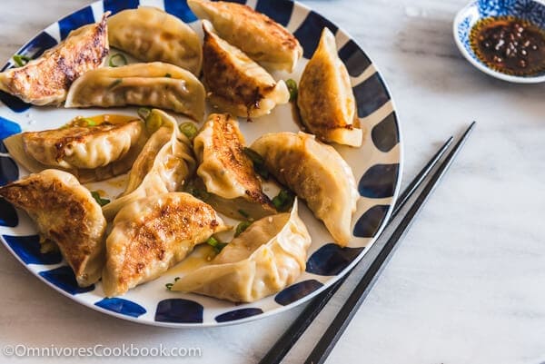 Carrot Dumplings - An elegant vegetarian dumpling that uses carrots, bamboo shoots, mushrooms, and eggs to create a fresh, moist, and rich filling.