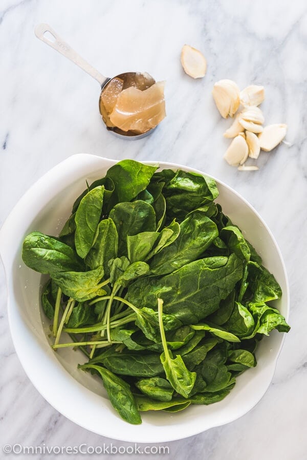 Garlic Spinach in Chicken Broth (上汤菠菜) - The tender spinach is served in a rich and garlicky broth. Originally a restaurant dish, now you can easily make it at home to add delicious leafy greens to your dinner.