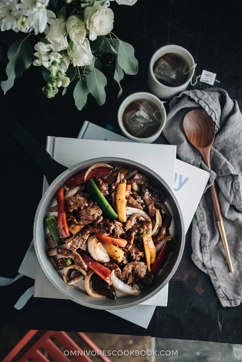 Restaurant-style black pepper steak that is tender, juicy and rich, with crisp veggies and a scrumptious sauce that goes perfectly with steamed rice. {Gluten Free Adaptable}