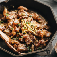 Create crispy, juicy, and tender restaurant-style orange beef using the cheapest cuts, and learn to make a super aromatic sauce that’s tastier and healthier than takeout. #chinese #beef #recipes #glutenfree #takeout