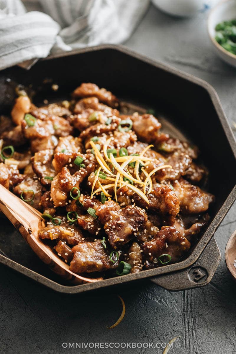 Close-up of orange beef in a cast iron skillet