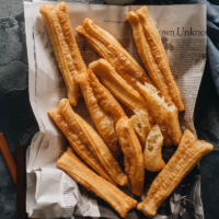 Homemade You Tiao (Chinese Donuts) are crispy on the surface, extra airy, fluffy, and tender inside. Learn how to make the classic Chinese breakfast staple with safe ingredients while achieving the best texture, just like the street vendors.