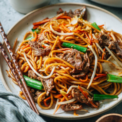 Tender slices of beef mingling with thick lo mein noodles, vegetables, and a savory sauce are perfect for tonight’s dinner in this beef lo mein. And it takes less time than takeout to put on your table!