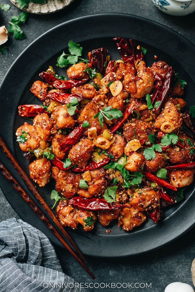 Plated La Zi Ji with chili peppers and cilantro