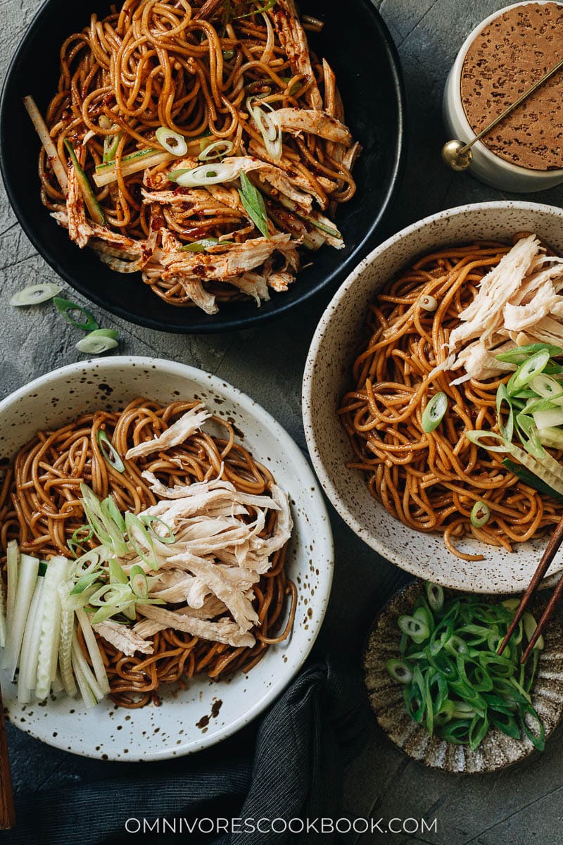 Chinese chicken noodle salad garnished with cucumber