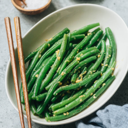 Ginger green beans is an appetizer with crisp blanched green beans in a refreshing gingery sauce. It is very easy to put together and it pairs well with any main dish to make a balanced meal. {Gluten-Free, Vegetarian / Vegan Adaptable}