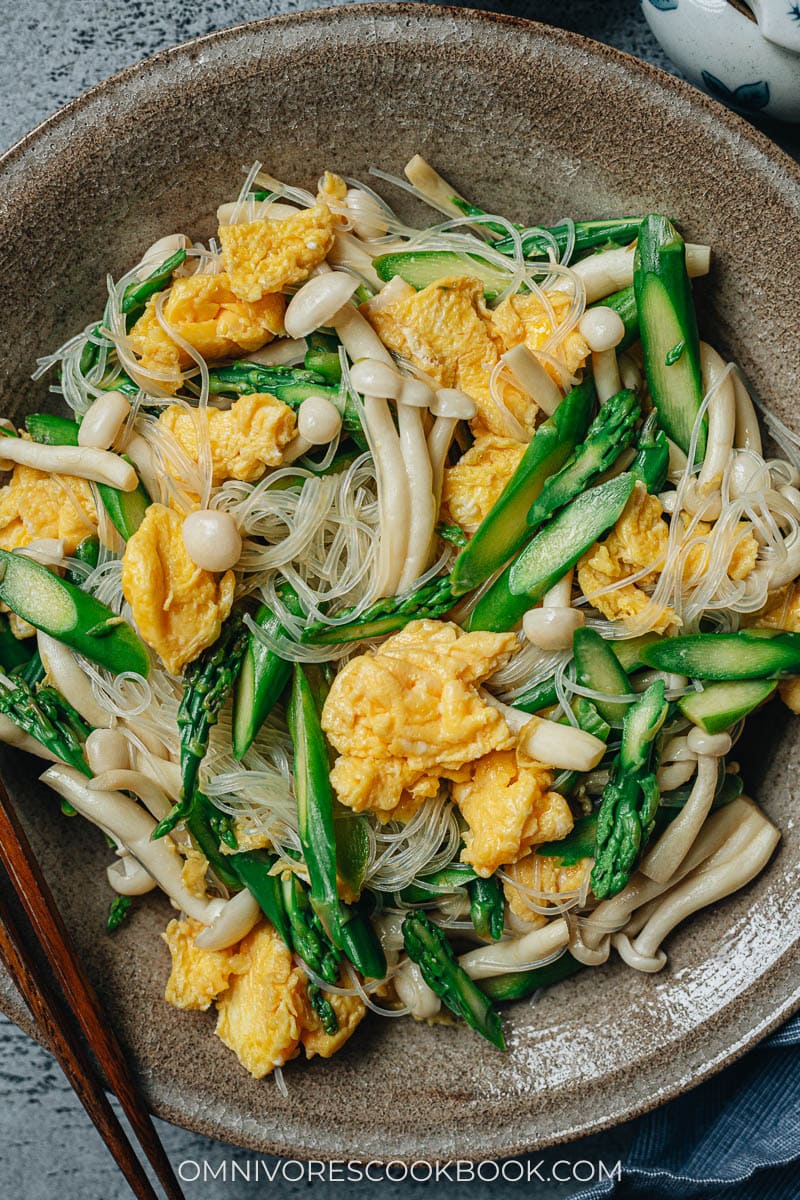 Asparagus salad with mushrooms and eggs close up