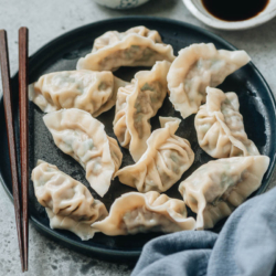 Pork and chive dumplings are one of the most popular types of dumplings in Northern China. The filling is made with juicy pork, bursting with an intense savory flavor of garlic chives, and boiled until tender and hearty.