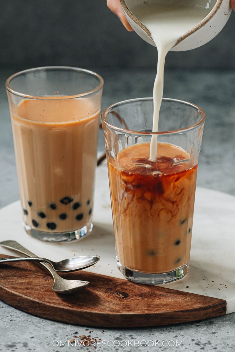 Pouring milk into bubble tea